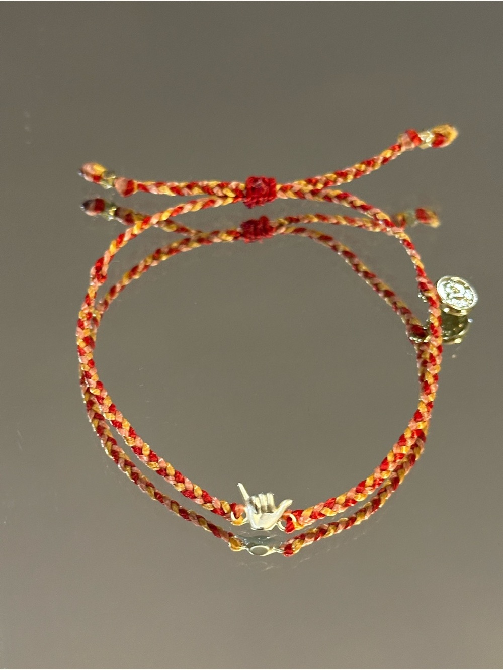 Pura Vida. Red and Gold Braided Cord Bracelet with Shaka Charm